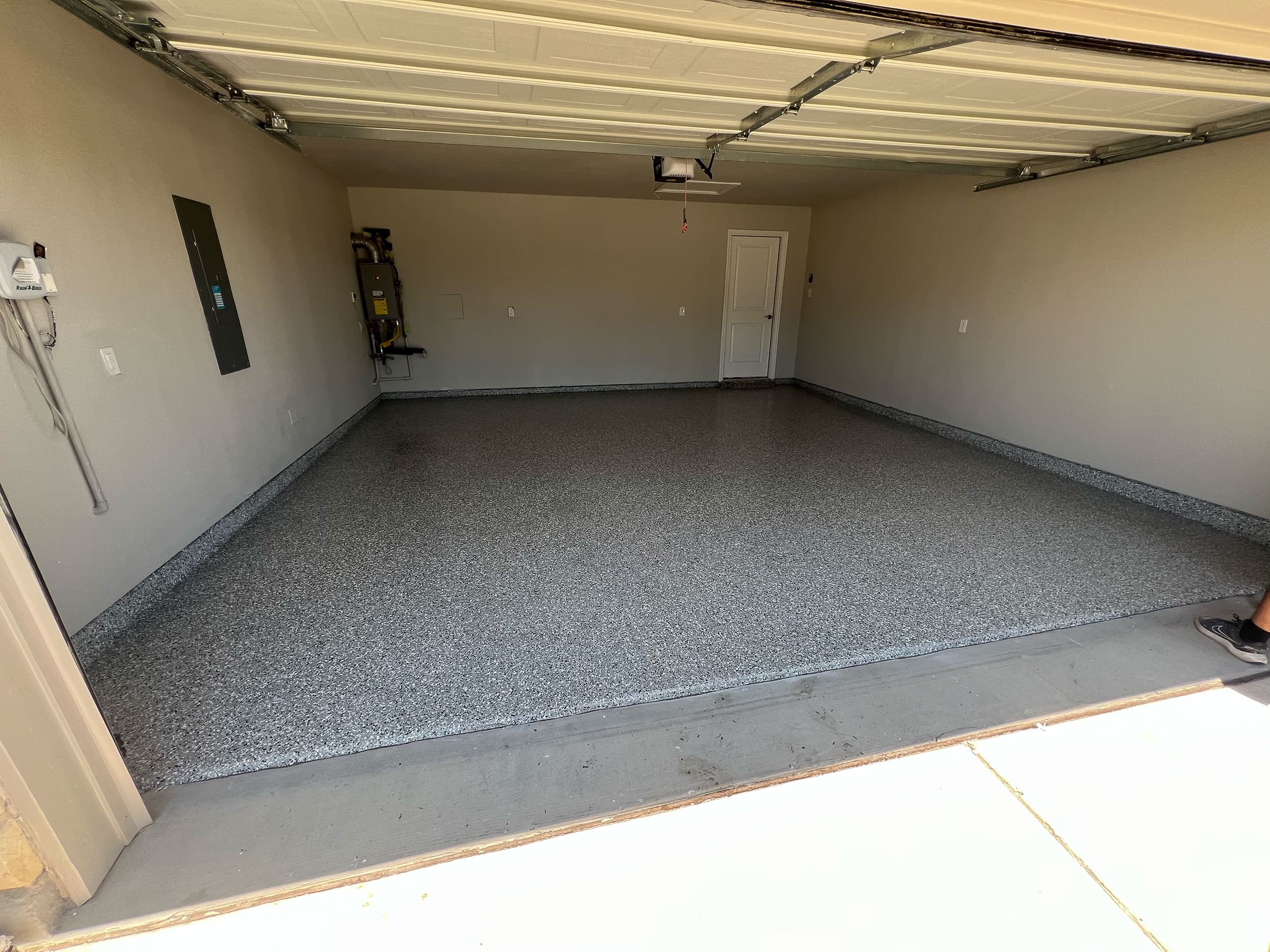 Finished epoxy flooring project with polished final coating